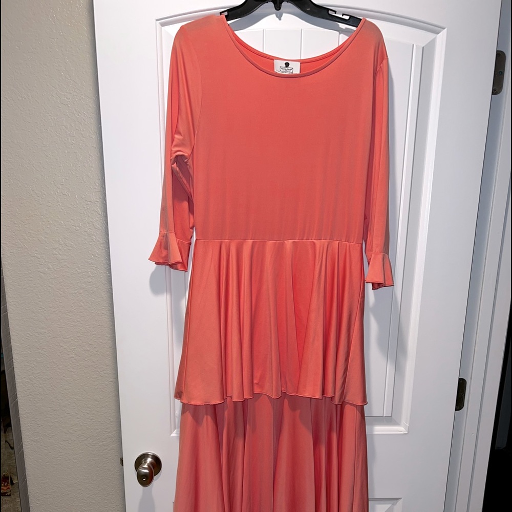 Dainty Jewell’s Coral colored layering dress.